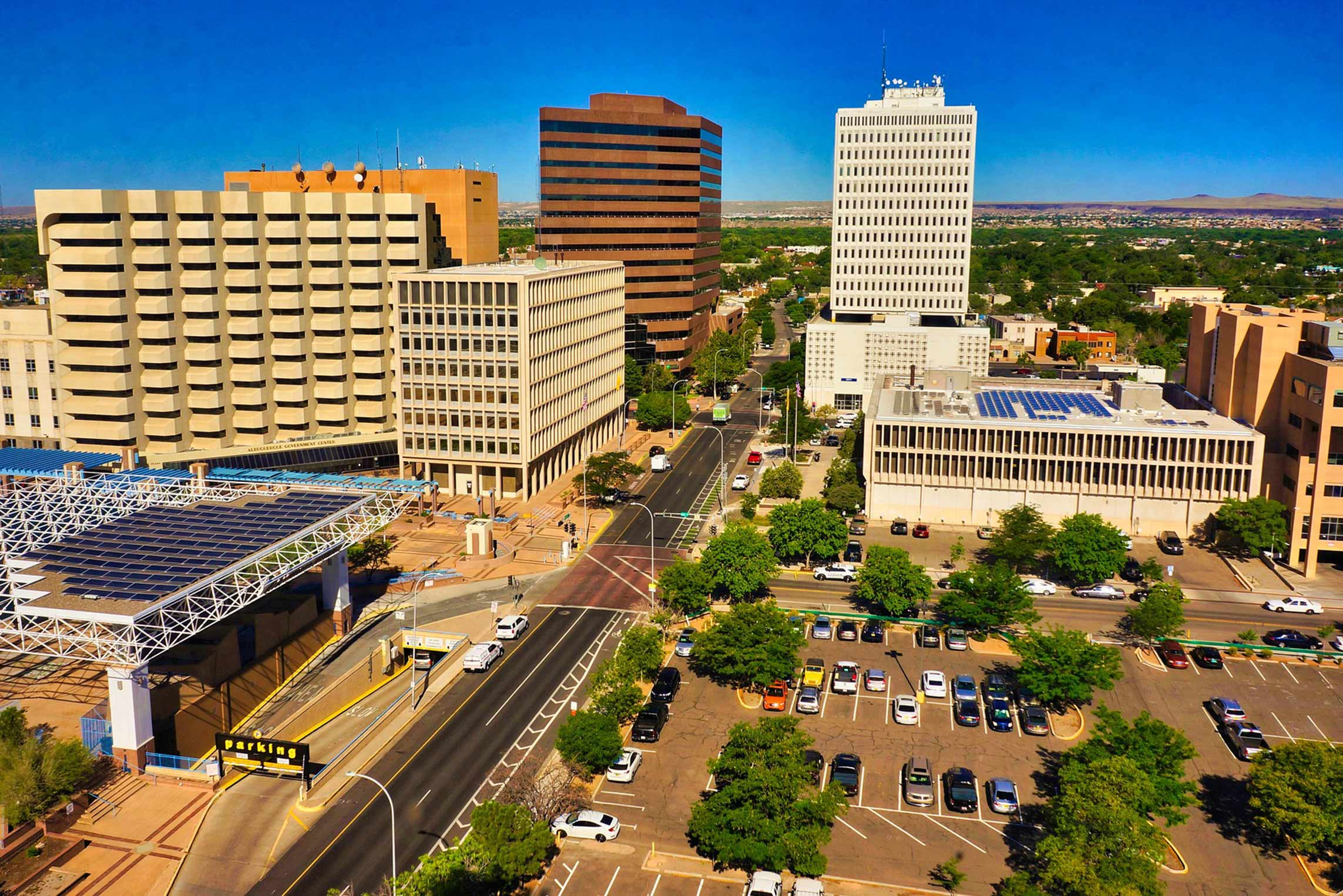 Knee Scooter Rental Albuquerque. Albuquerque skyline buildings.