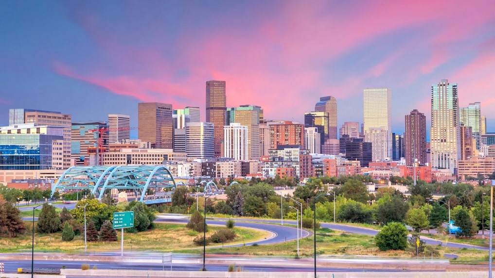 Will Insurance cover a knee scooter cost? Rent a scooter now on our Denver Location. Picture taken was a panorama of Denver skyline at twilight.