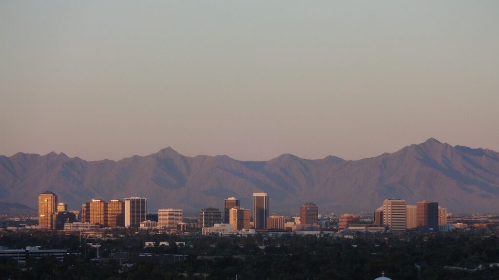 Renting a knee scooter is cheaper than buying in Phoenix. Downtown Phoenix during sunset.